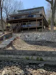 Lakefront pet-friendly home/private dock with boat slip and two place PWC lift.