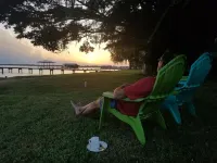 Lakefront getaway with white sand, clear water, gorgeous sunsets