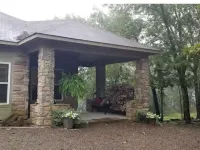 Relax at This Mountaintop Retreat Hotels in Conway County