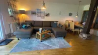 Gulfhof vacation apartment "Langeoog" with a view of the nature reserve