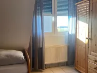 Comfortable holiday center house with its own garden directly at the nature reserve Hotels in Borkum