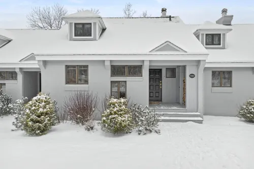 Escape to This Mountain Retreat Near Hiking Trails, Pools, and Golf Courses