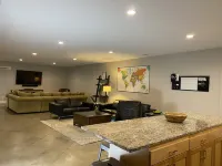 Steps from KU, Private Guest Suite & Game Room Hotels in Lawrence