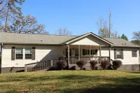 Spend Lake Daze at Lake Sinclair retreat w/ renovated basement and private dock!