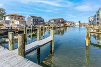 NEW LISTING! 15th St Beach Retreat #1 - 3 Bed/3 Bath Waterfront with Boat Dock
