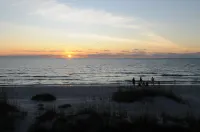 Completely remodeled beach front condo with full ocean views, steps to the water