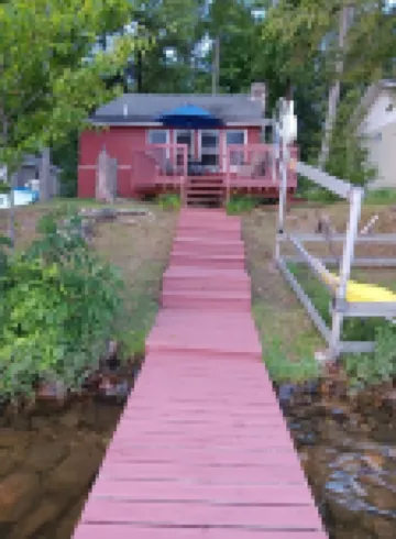 Beautiful full log cabin with  direct private frontage , beautiful sunsets .