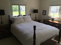 Charming and Cozy Lake Front Cottage on Private Beach