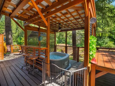 Every Season Couples Retreat! River Front Cabin with Hot tub and outdoor Shower