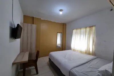 OYO 93493 Wira Residensia Syariah Hotels near House of Representatives Building of Binjai City