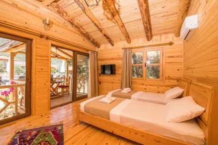 Doganin Ruhu Hotel & Bungalow Отели в г. Каш