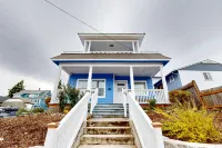 Relaxing river-view home with private patio, grill, covered balcony, & W/D