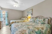 Seasonally-Heated Outdoor Pool and Grilling Areas - Charming Coastal Haven