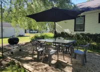 Charming Lakeview Cottage with Fire Pit and Outdoor Seating - Cozy Retreat