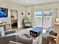 Zero-Entry Pool and Canal Views - Charming Coastal Retreat