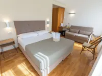 لونجوماري سويت آند سبا Hotels near بوسيليبو