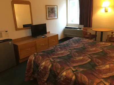 Economy Inn & Suites Hotels near Top Stop Convenience Store