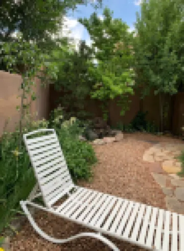 Luxurious and sanitized Studio, original adobe walls, wood floor, real sanctuary