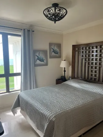 Views! Views! Penthouse with Membership Golfing, Beach, Pool and 2 Carts