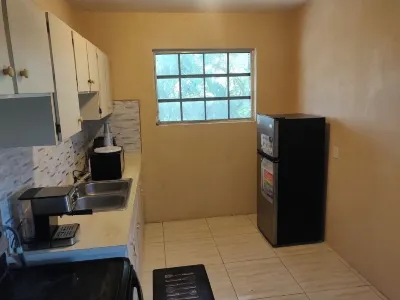 Charming family friendly home,furnished with parking facilities,near malls/beach Hotels in 