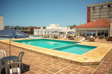 Farol Hotel Отели в г. Торрес