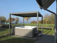 Vacation home directly on the lake, outdoor whirlpool and exclusive 20sqm wellness sauna 烏特格翰酒店