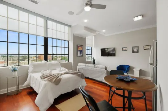 Stunning Rooftop Pool and Chic Amenities - Magnificent Urban Retreat