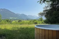 Vacation home Allgäu: eat-in kitchen, fireplace, 4 bedrooms, 3 bathrooms, terrace & hot tub