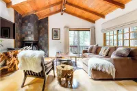 Cabin Nestled in Forested Canyon