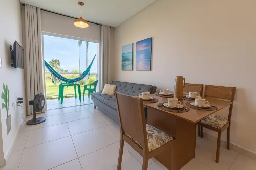 Flats Mar'Bella Com Varanda Para Relaxar e Praia Para Curtir, Garagem Privado e ArCond - homestay