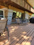 Spacious and cozy home with gas fireplace, boat dock, and lake views