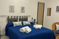 Sweet World - Family Room with Terrace Near the Beach