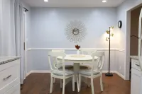 Two kitchens, patio, fenced backyard, and playground.