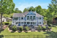 Go Jump In the Lake! Just Listed Custom Lakefront Home with Dock & Amenities!