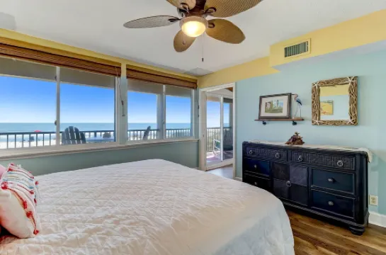 Beach Style Condo Includes Google Mini Home and Beach Access 2 Bedroom Condo by RedAwning