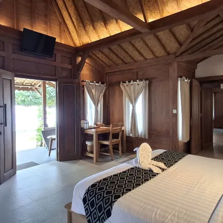 Blue Harbor Beachfront Villas & Resto Отели рядом с достопримечательностью «Бухта Сампалан»