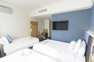 トリプルルーム 喫煙可 (シングルベッド2台+エクストラベッド) ハートンホテル京都の写真