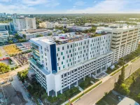 Serena Hotel Aventura Miami, Tapestry Collection by Hilton Hotels near Men's Wearhouse