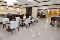 Country Inn & Suites by Radisson, Pensacola West, FL - servizio colazione