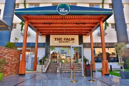 The Palm Hotel Отели в г. Kafr Abu Tabl