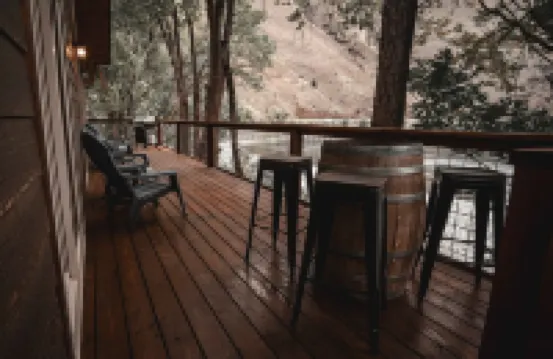 Mid-century modern cowboy retreat with a 35-ft. deck on the Salmon River.