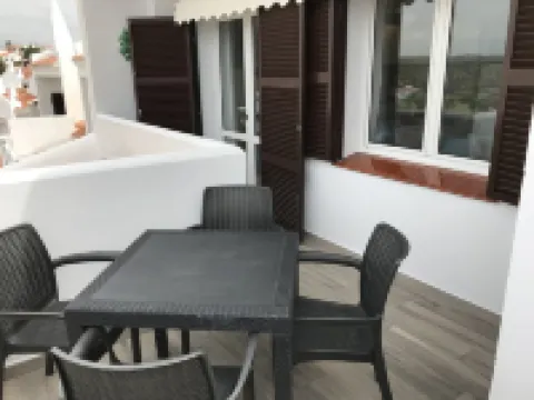 Modern apartment with a fantastic view over the bay Hotels in Cala en Porter