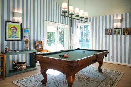 Heated pool, sandy beach, pier, and playground set punch point apart!