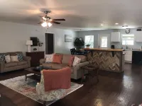 La Casita Verde Blanco on the banks of the river