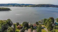 Lakefront Home With Island View Hotels in Otsego
