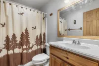 Log cabin nestled in the mountains and situated on Collett Creek