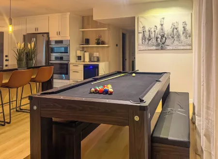 Steam and Rainfall showers, Chef's kitchen, king beds, 75 inch TV