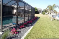 Villa Capri | Waterfront Retreat with Heated Pool - Beach