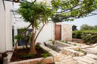 Artemis Village Apartments & Studios Hotels near Holy Trinity (Agia Triada) Tzagaroli Monastery