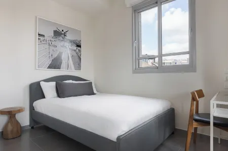 Bauhaus Boutique by TLV2Rent Отели рядом с достопримечательностью «Площадь Ицхака Рабина»
